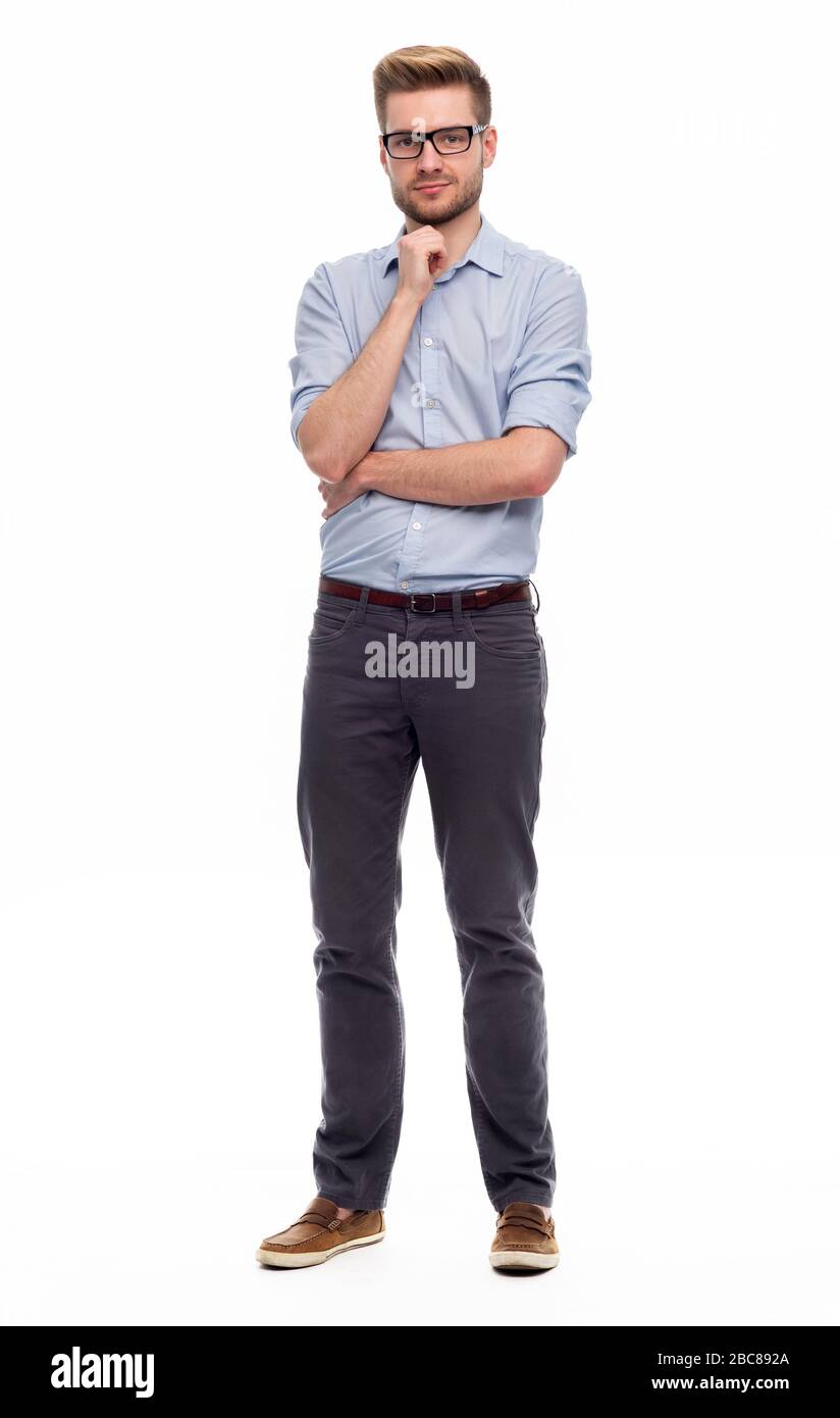 Portrait of young man standing on white background Stock Photo - Alamy