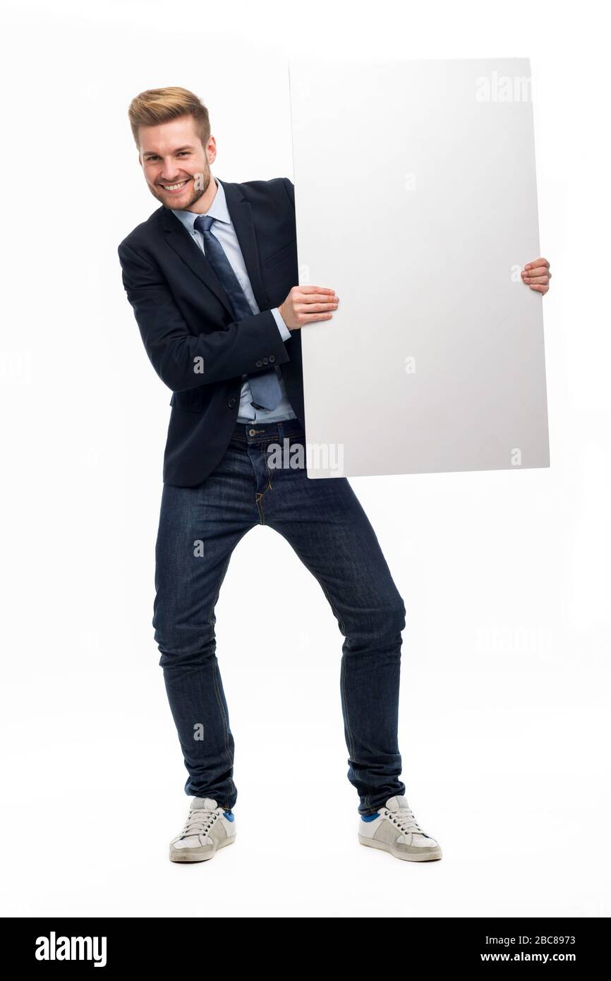 Business man holding white board Stock Photo