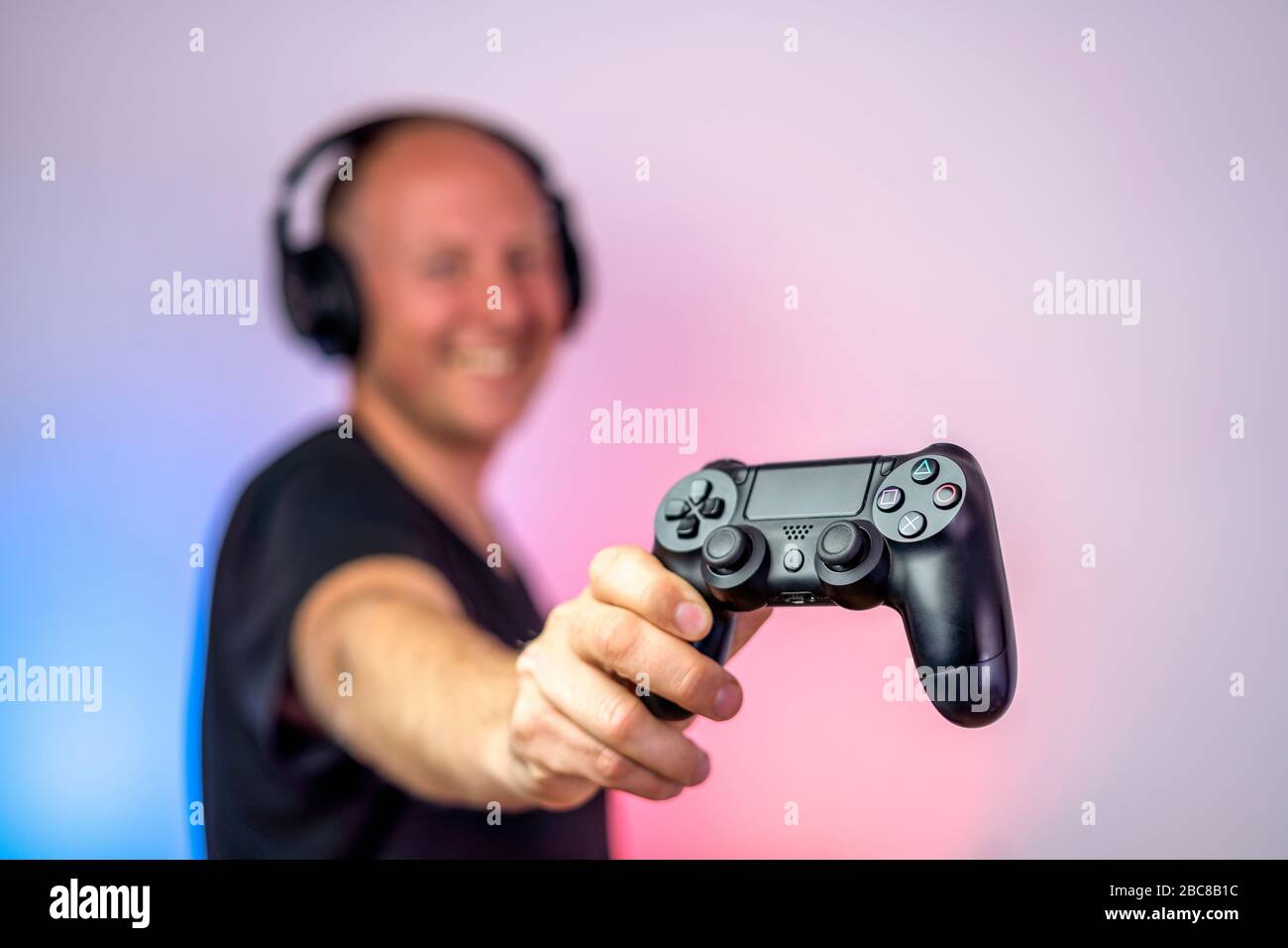 Premium Photo  Close up of player holding joystick, losing video games in  front of computer. gamer using joystick and playing online games on  monitor, sitting at desk. man gaming with modern