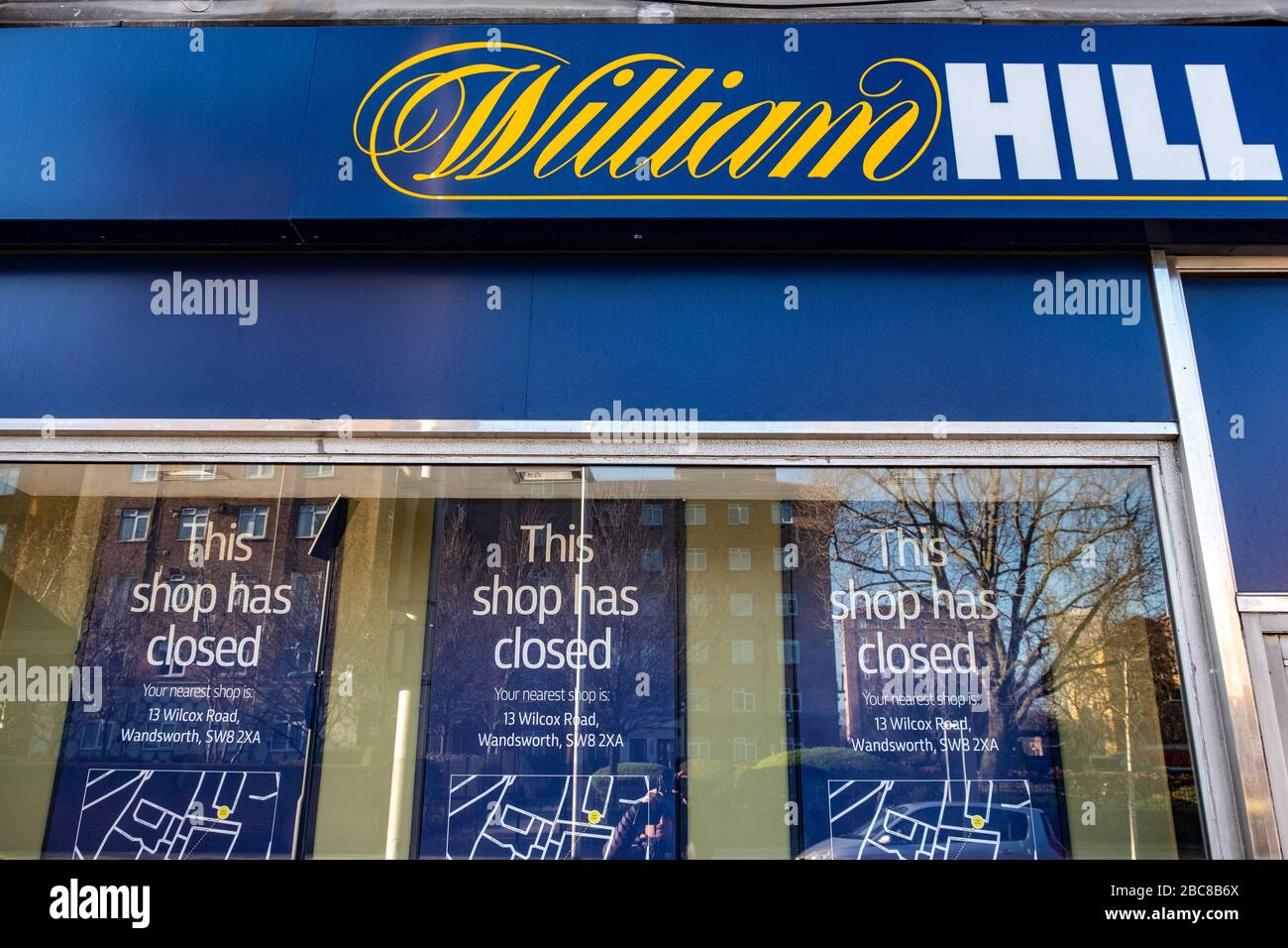Recently closed down William Hill high street bookmaker / betting shop - exterior logo / signage- London Stock Photo