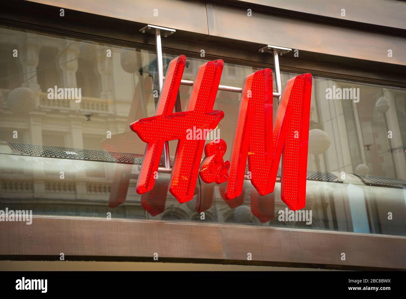 H&M store- British high street fashion brand- exterior logo / signage- London Stock Photo