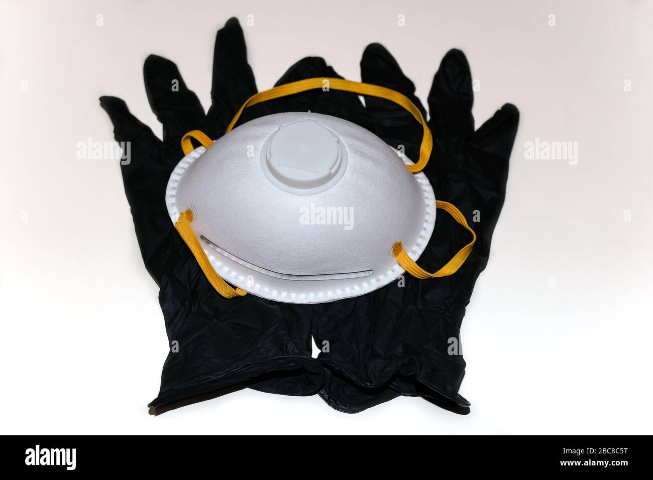 Safety plastic gloves and protective virus ffp2 mask ,coronavirus covid disease control items Stock Photo
