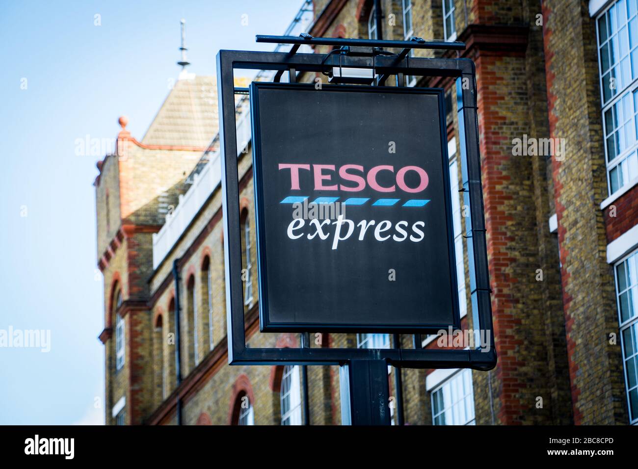 Tesco Express- local version of large British supermarket chain- exterior logo / signage- London Stock Photo