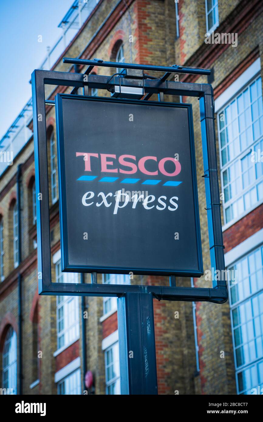 Tesco Express- local version of large British supermarket chain- exterior logo / signage- London Stock Photo