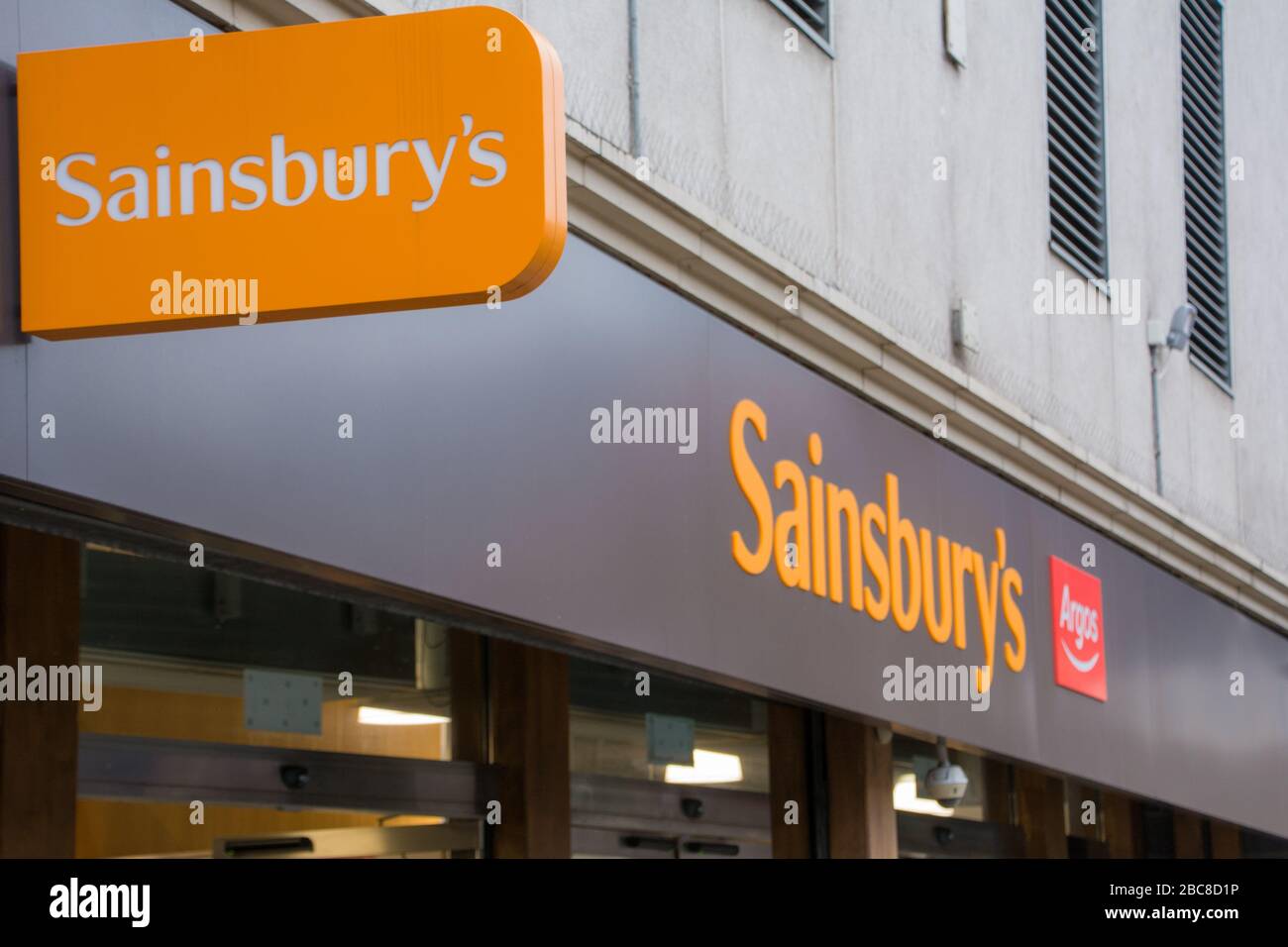 Sainsbury's supermarket store with Argos logo on exterior signage- London Stock Photo