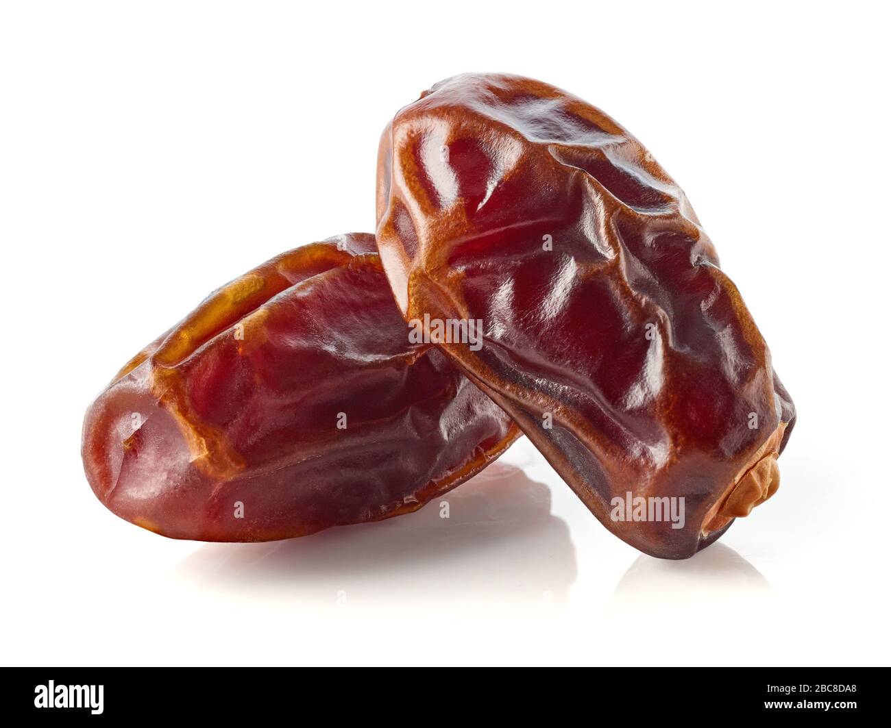 Whole dates isolated on white background Stock Photo Alamy