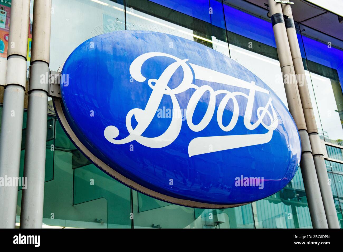 Boots, British high street pharmaceuticals & beauty retailer exterior logo / signage- London Stock Photo