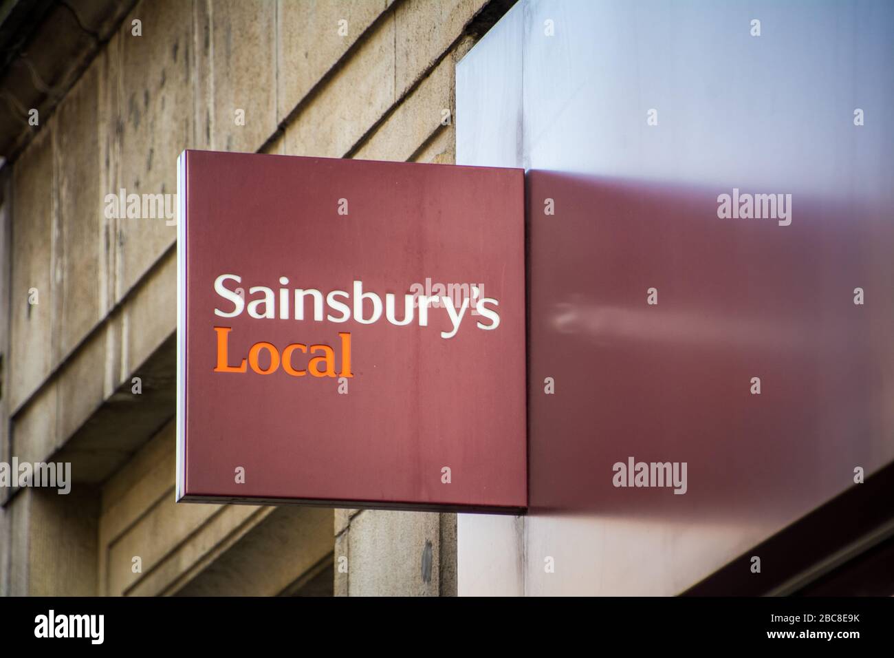 Sainsbury's Local, British supermarket branch, exterior logo / signage- London Stock Photo