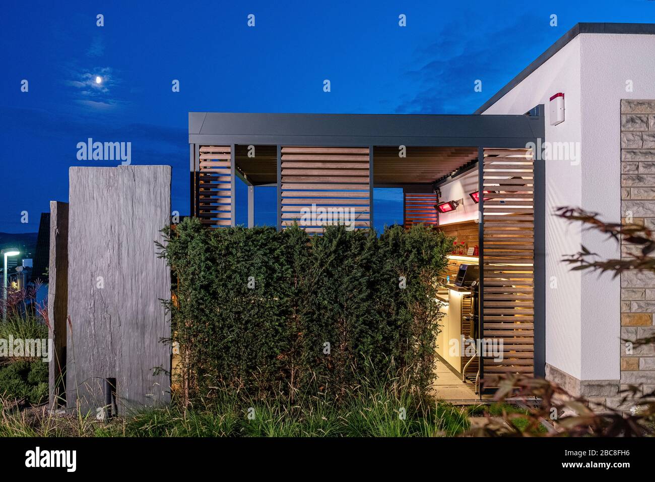 Covered terrace at night in the moonlight Stock Photo