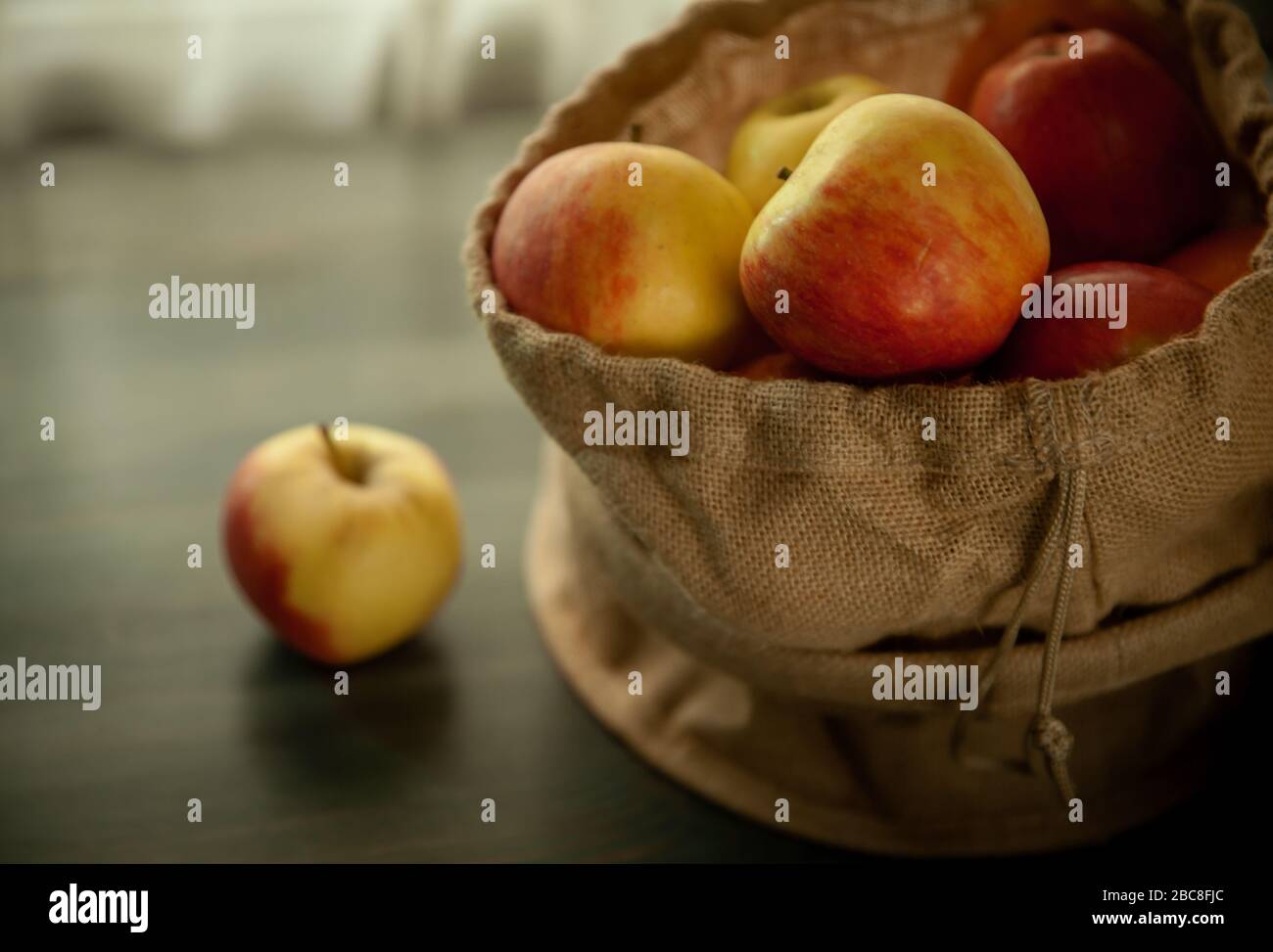 apples in saclcloth fresh helthy season fruits vintage Stock Photo