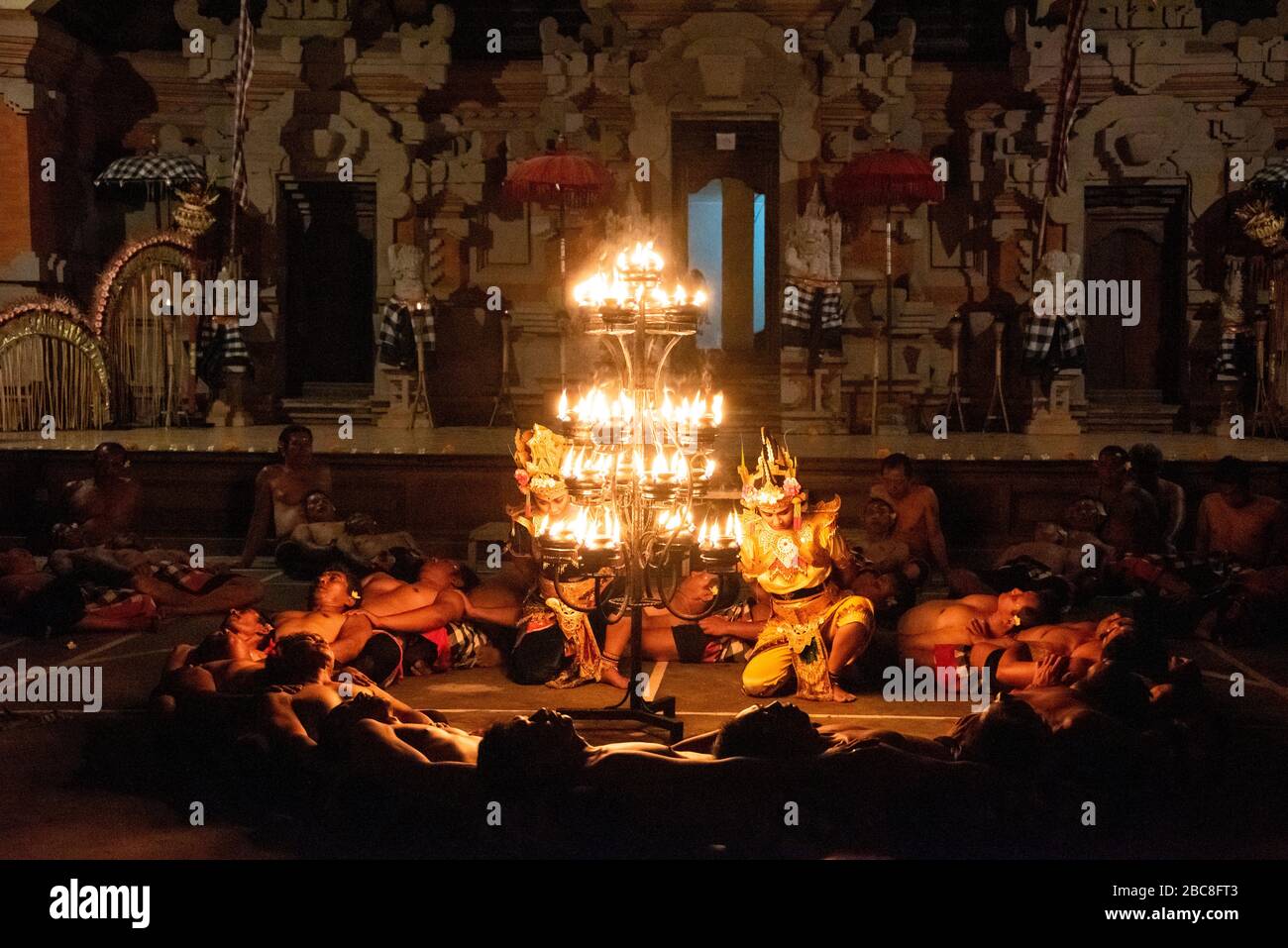 Horizontal view of a Kecak Fire Dance in Bali, Indonesia. Stock Photo