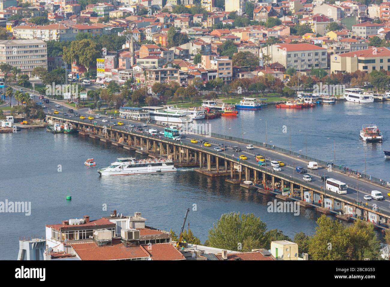 Istanbul, Turkey.  Old Galata Bridge and ferry boat. Stock Photo