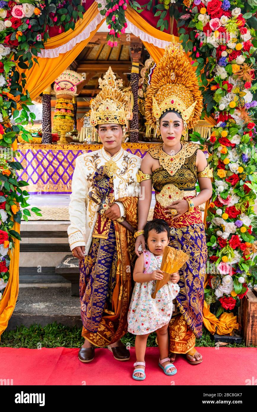 Vertical portrait of the bride and groom at a Balinese wedding, Indonesia. Stock Photo