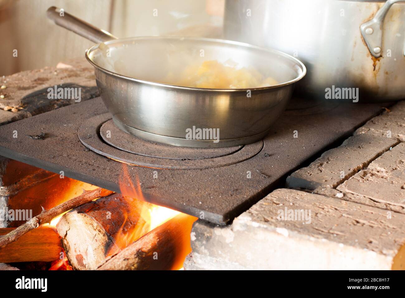 https://c8.alamy.com/comp/2BC8H17/traditional-of-making-food-on-the-stove-over-a-natural-fire-for-cooking-2BC8H17.jpg