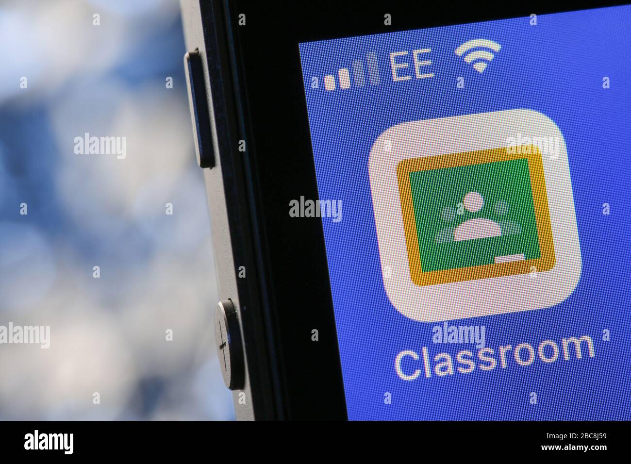 Google Classroom app on an iPhone. Stock Photo