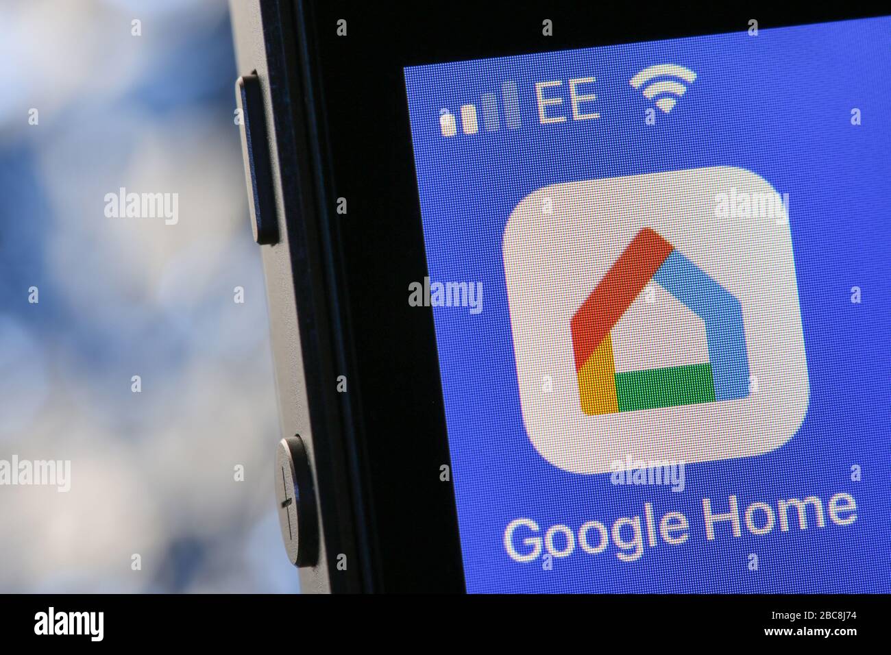 Google Home app on an iPhone. Stock Photo