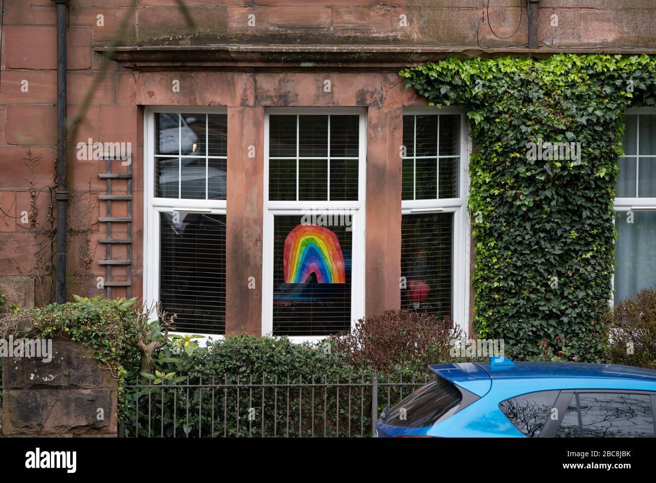 Glasgow, Scotland, UK. 3 April, 2020. Images from the south side of Glasgow at the end of the second week of Coronavirus lockdown. Pictured; hand drawn rainbows and messages in windows of flat in Shawlands. Iain Masterton/Alamy Live News Stock Photo