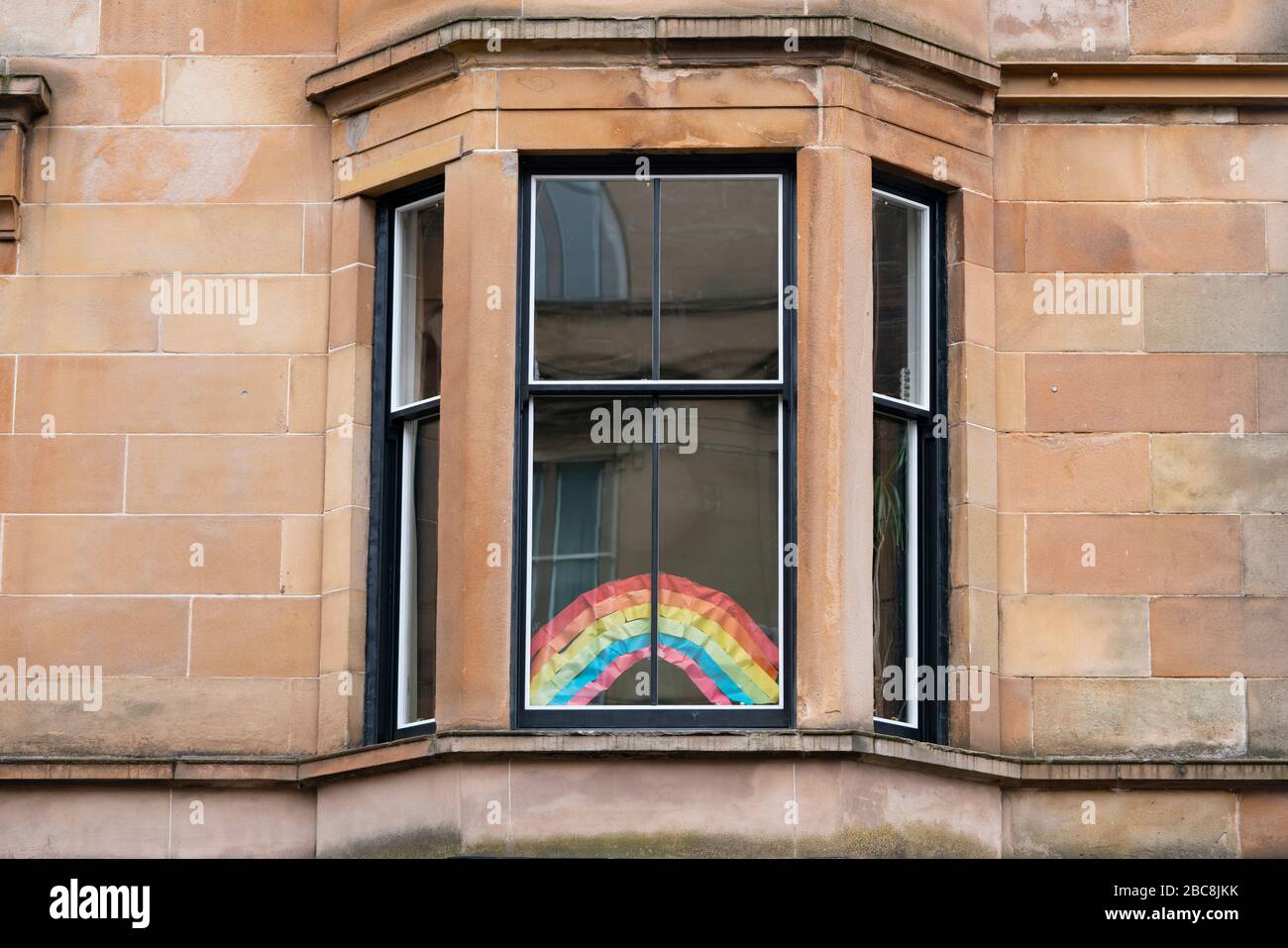 Glasgow, Scotland, UK. 3 April, 2020. Images from the south side of Glasgow at the end of the second week of Coronavirus lockdown. Pictured; Rainbow in window of flat in Govanhill. Iain Masterton/Alamy Live News Stock Photo
