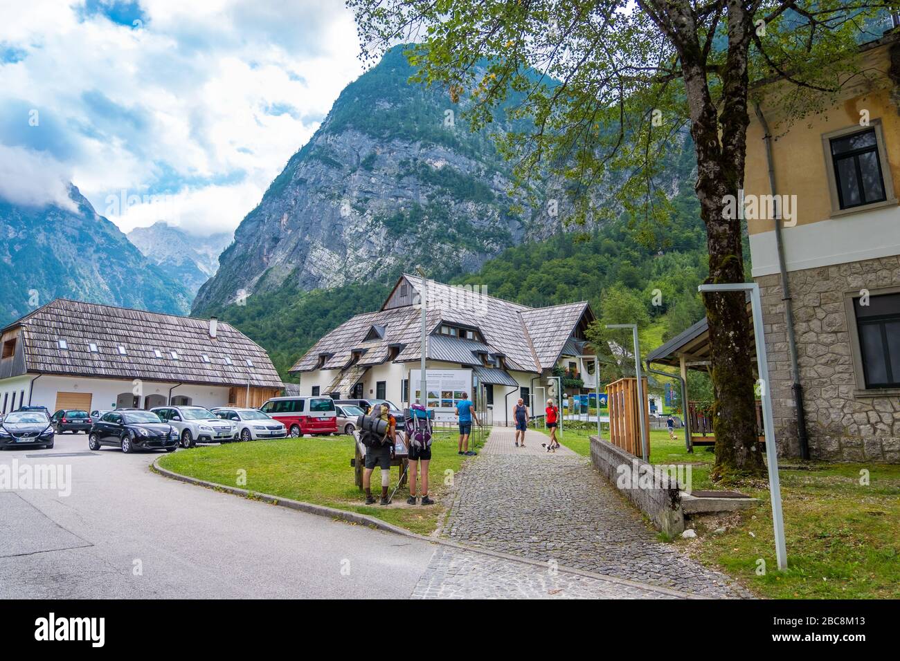 Bovec, Slovenia - August 11, 2019: Hikers in Small town Bovec in Julian Alps. Popular place for extreme sports and active recreation in Slovenia Stock Photo