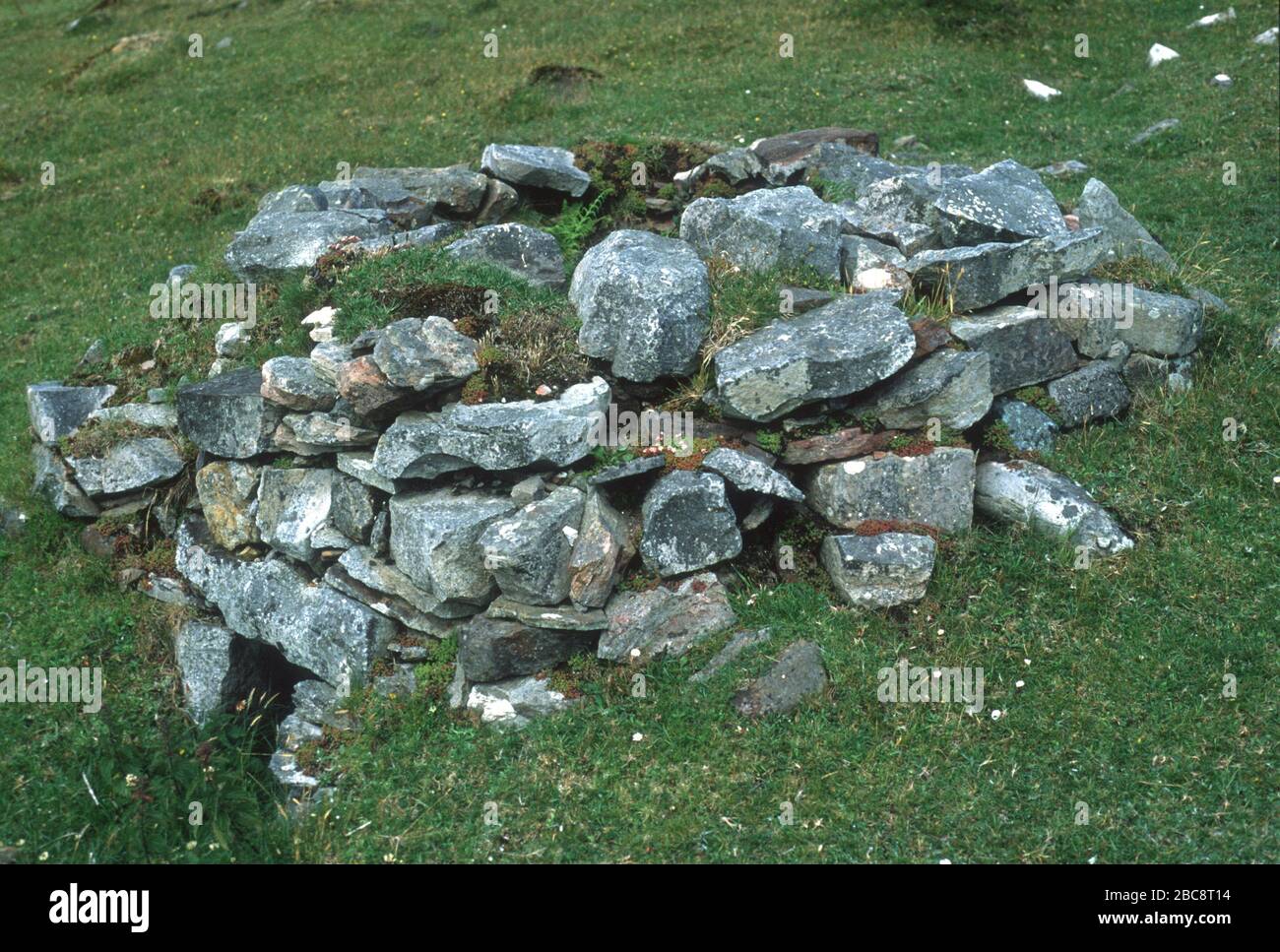 Underground stone built chamber on Clare Island, County Mayo, Ireland. Possibly a Neolithic burial site. Stock Photo