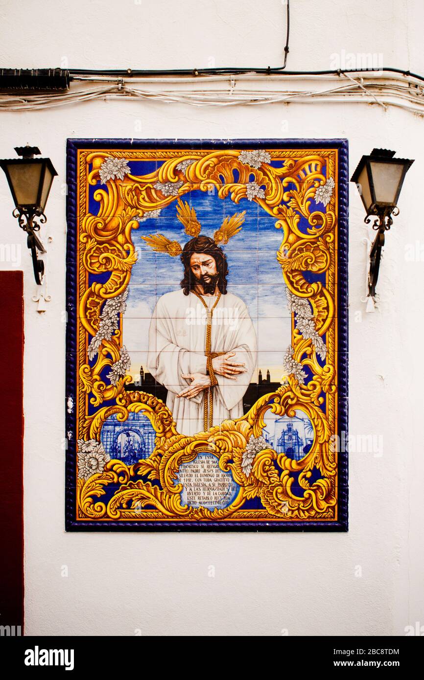 Cordoba, Andalusia, Spain  - 15 May 2013: Mosaic tile icon ceramic decoration on mosaic on the wall of Iglesia de San Francisco. Stock Photo