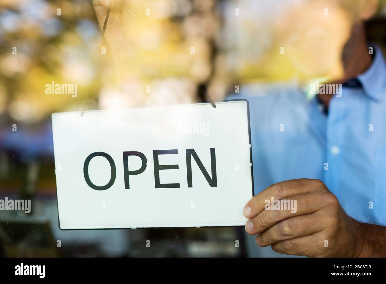 Man working in wine shop Stock Photo