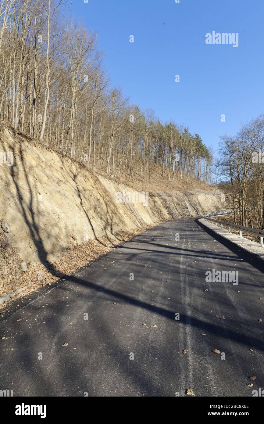 mountain asphalt road on a sunny autumn day Stock Photo - Alamy