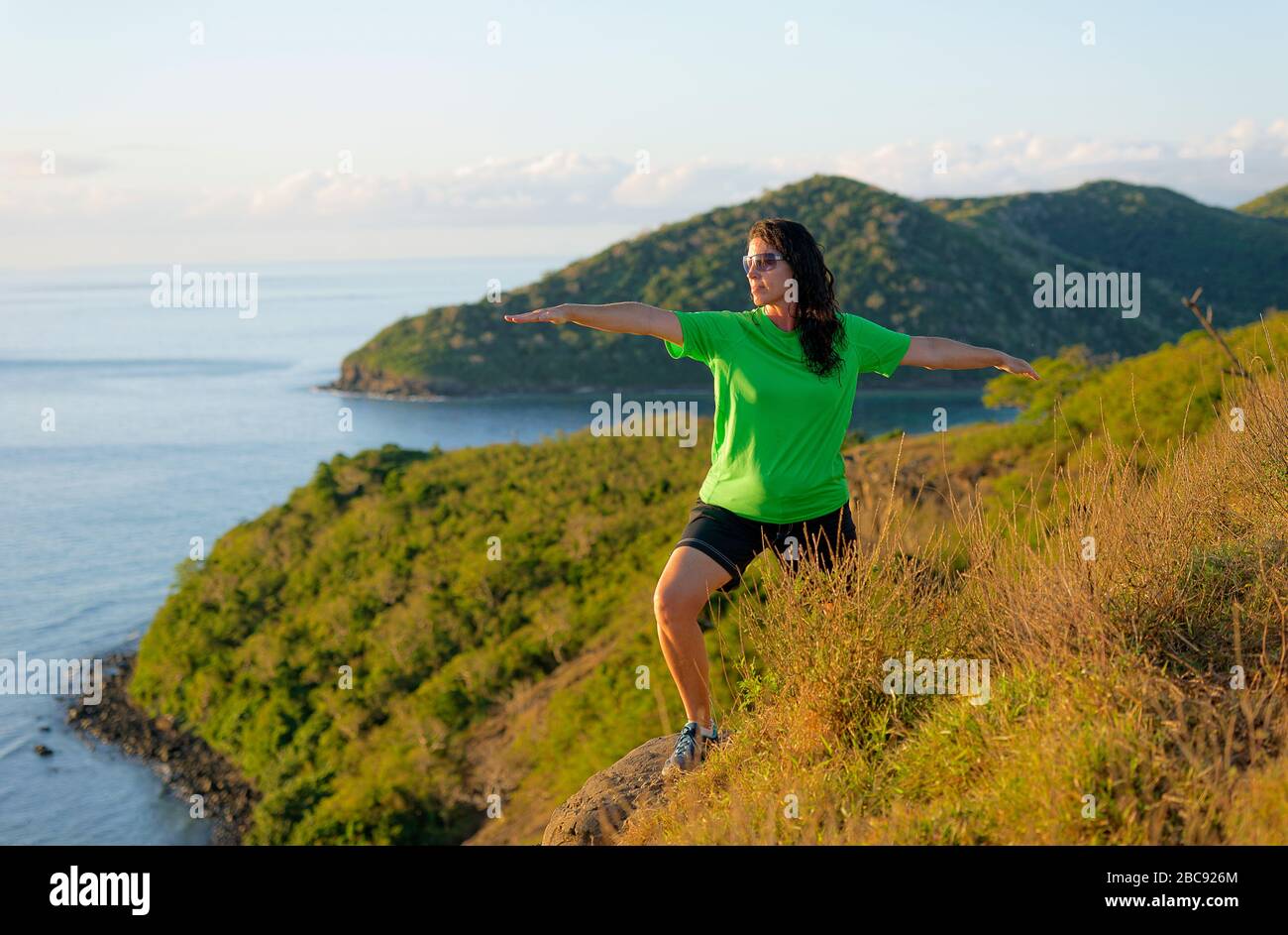 Woman practicing yoga, Drawaqa Island, Yasawa island group, Fiji, South Pacific islands, Pacific Stock Photo
