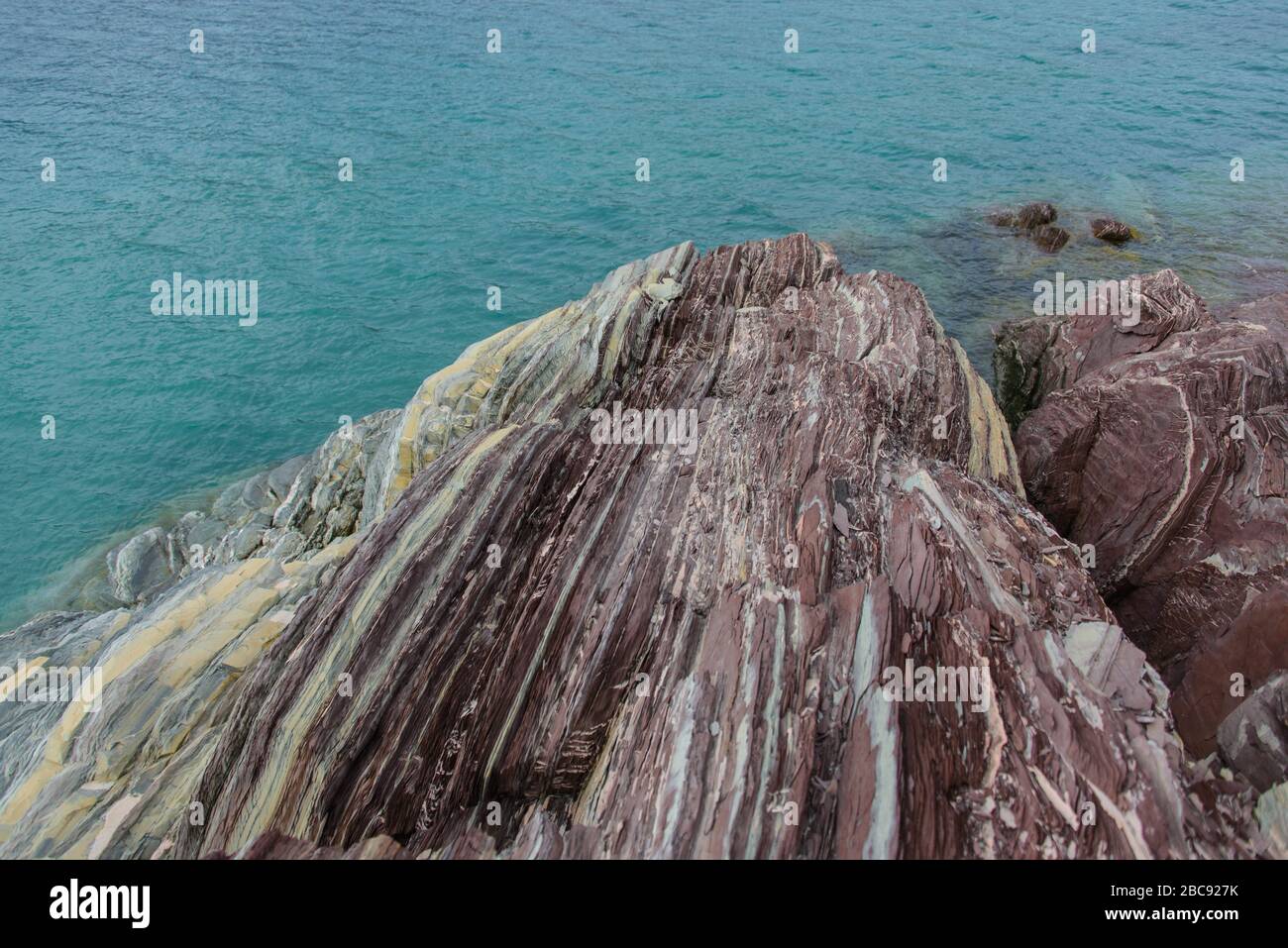 Greenland Coastal Rocks Colourful rocks in east Greenland close up. Rock texture Stock Photo ...