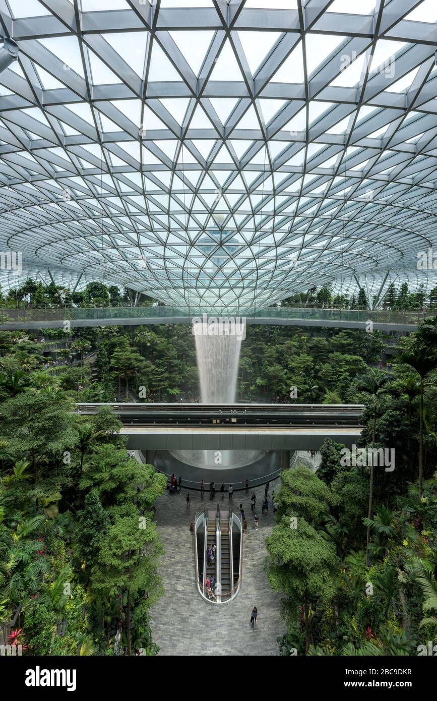 Singapore-30 Aug 2019: Jewel Changi Airport is a new terminal building  under a glass dome, with indoor waterfall and tropical forest, shopping malls Stock Photo
