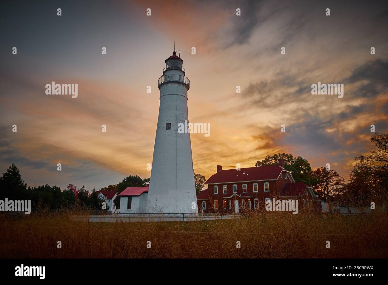 Sunset Photo of Fort Gratiot light house in Port Huron Michigan Stock Photo