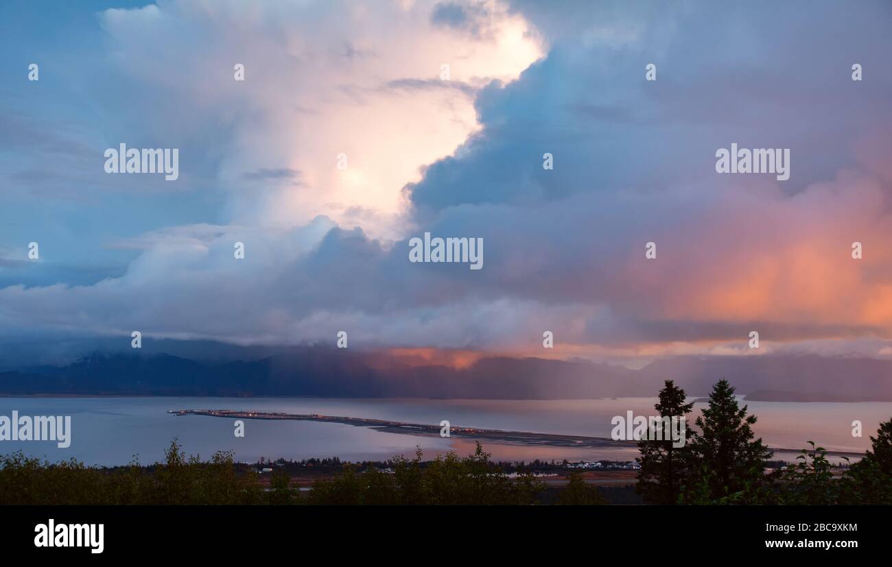 Thunderstorm over Kachemak Bay at sunset Stock Photo