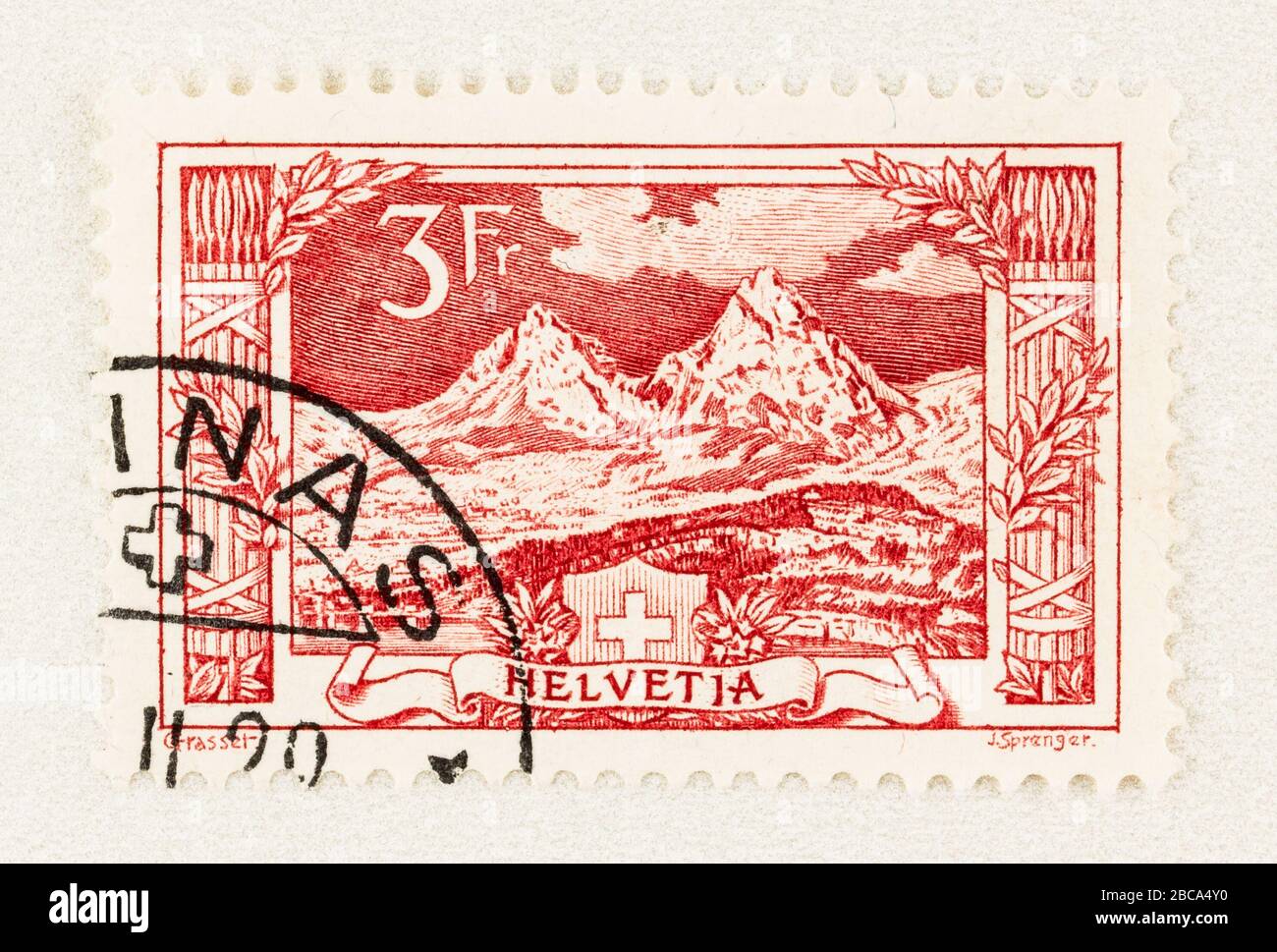 SEATTLE WASHINGTON - April 3, 2020: Close up of Swiss postage stamp  featuring Grosser Mythen, a mountain of Central Switzerland. Scott # 182. Stock Photo