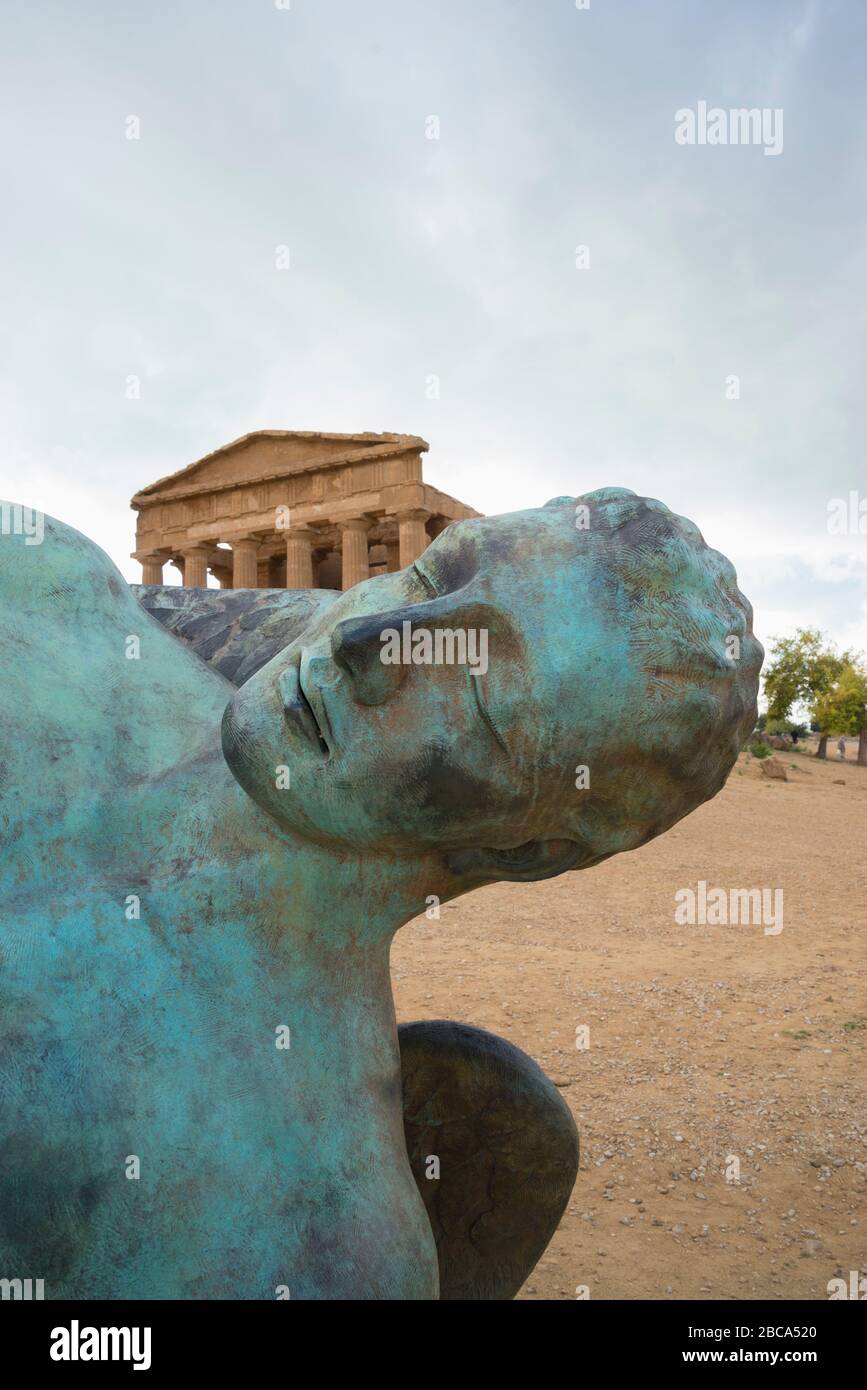 Modern sculpture of Icarus in front of the Temple of Concordia, Valley