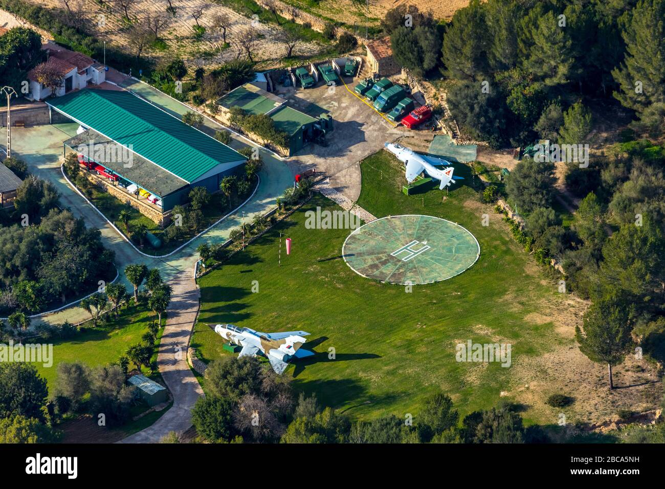 Aerial view, hotel complex with vintage cars and planes collection