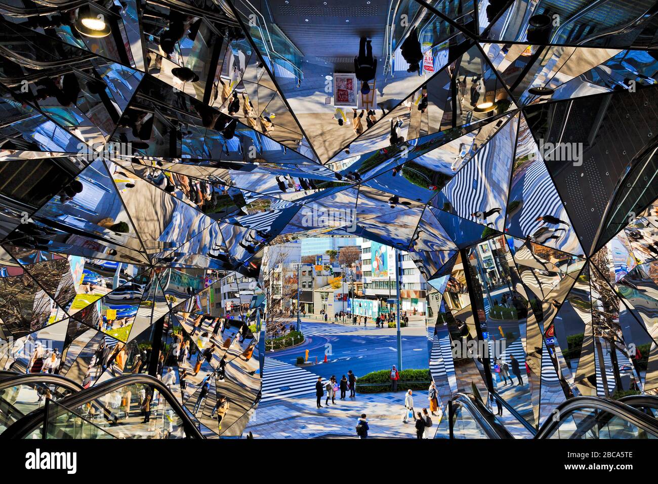 Entrance passage and tunnel to one of shopping malls made of broken mirrors in Harajuku shopping district of Tokyo, Japan. Stock Photo