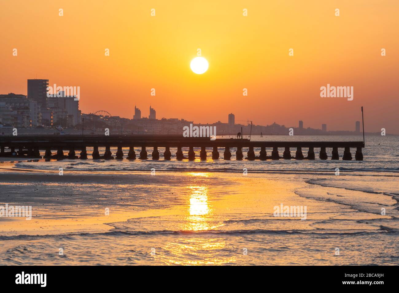 Jesolo, lighthouse beach at sunrise, adriatic sea, venice, veneto, italy Stock Photo