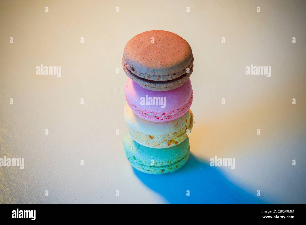 Macarons in different colours on a background Stock Photo
