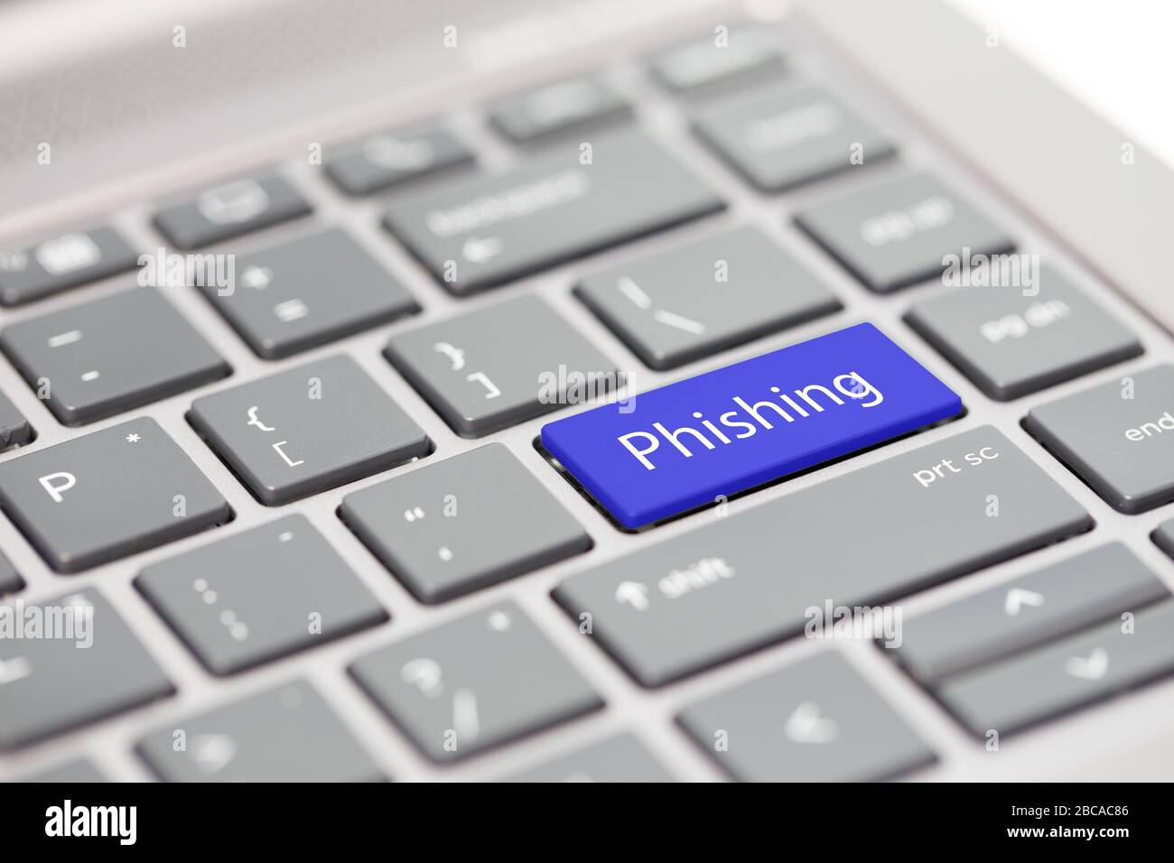 Cyber security hacking https MFA password phishing scam concept shown on close up enter key on notebook keyboard Stock Photo
