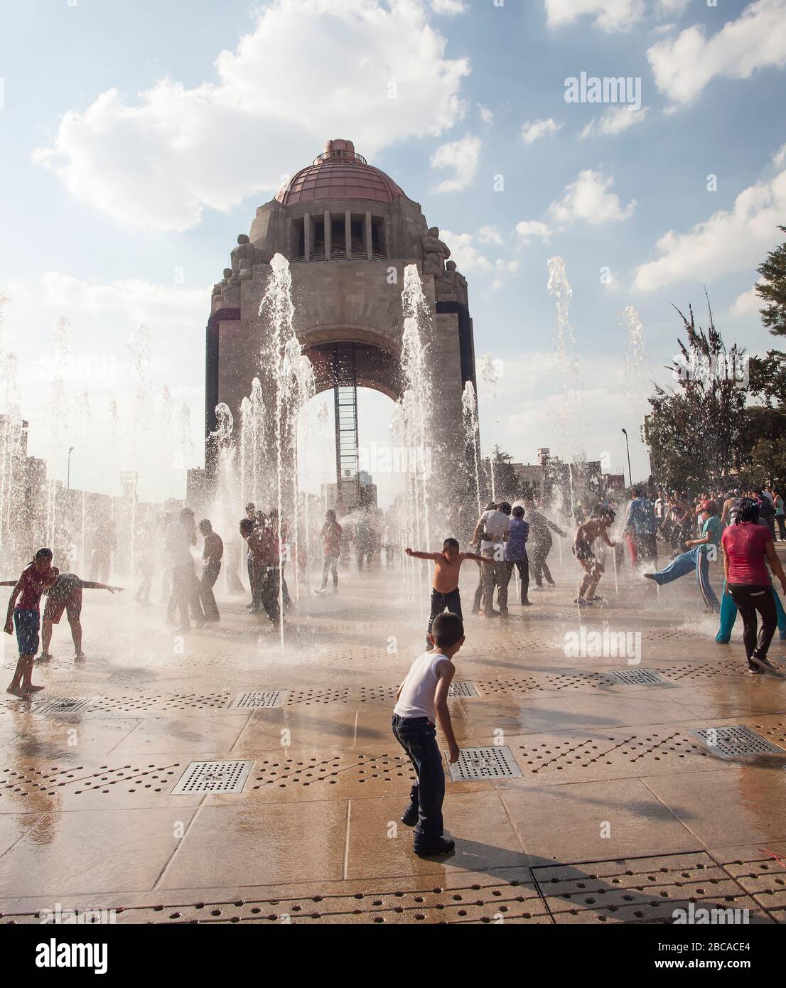 Mexico City youngsters coolling off in fountains Stock Photo
