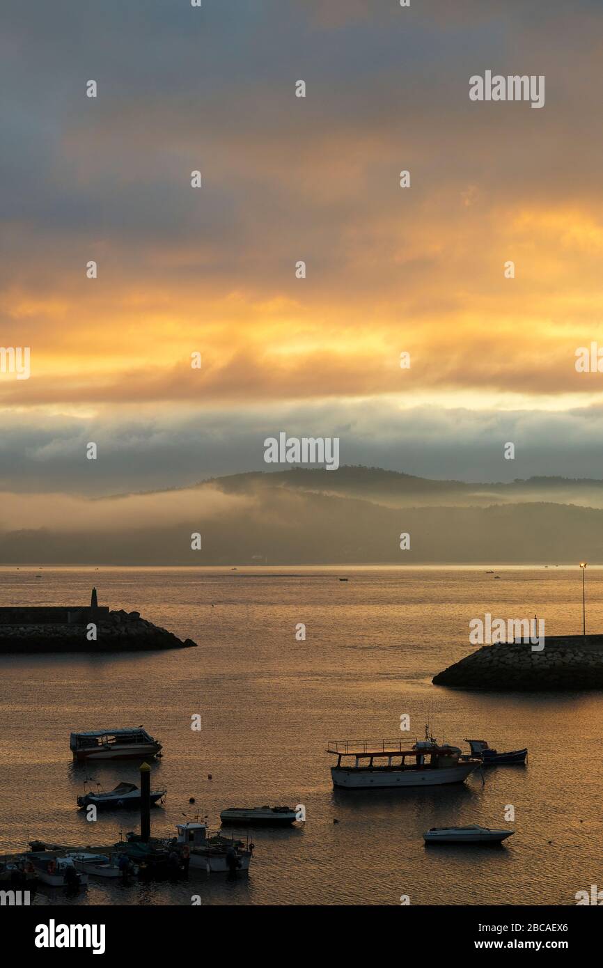 Spain, north coast, Galicia, Costa da Morte, Muxia, harbor, morning light Stock Photo