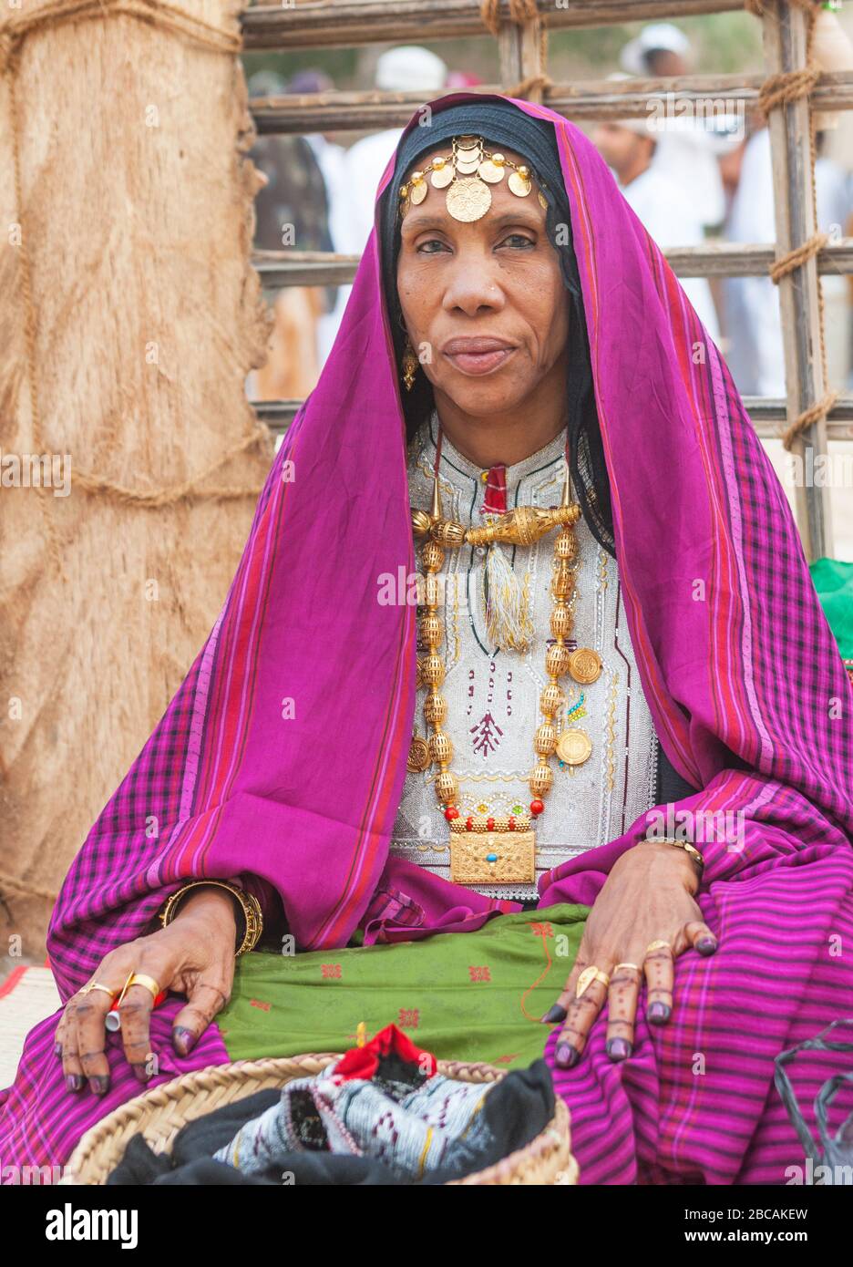Portrait of an unidentified, mature woman in traditional Omani tribal dress. Stock Photo