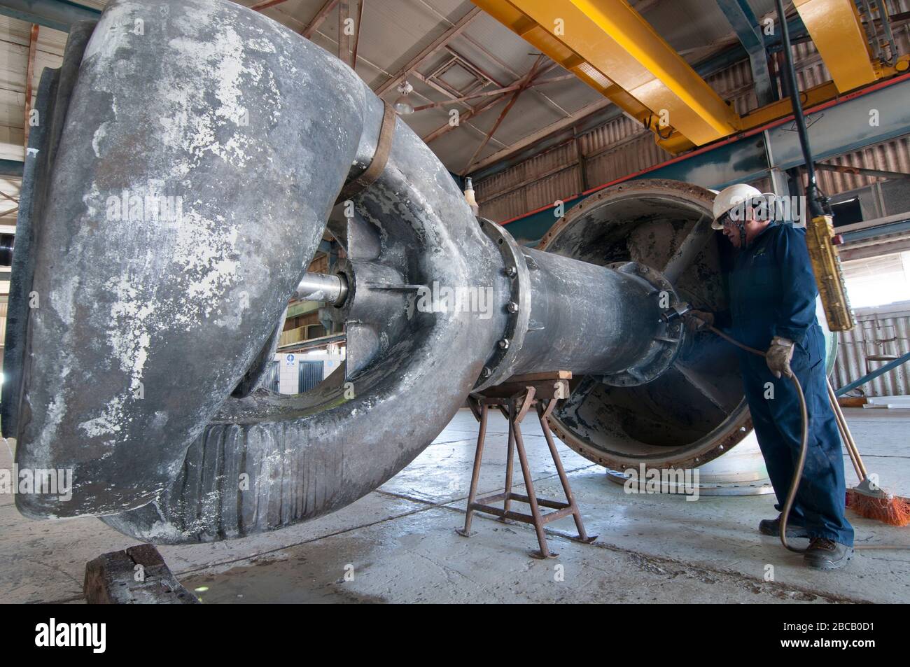 The industrial vertical water pump in a mechanical workshop ready for  maintenance Stock Photo - Alamy