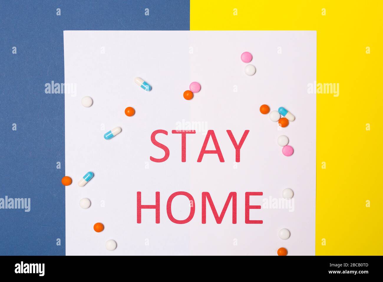 Words stay at home.Coronavirus Pandemic Protection Concept. Minimal concept. Stay safe, concept of self quarantine at home as preventative measure Stock Photo
