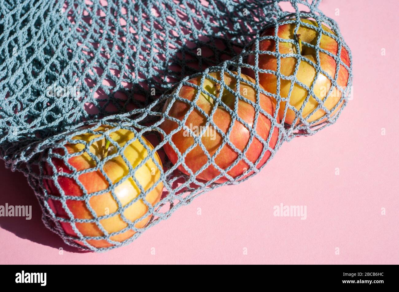 apples in knitted bag, Eco friendly, zero waste, Recycling. Go to store