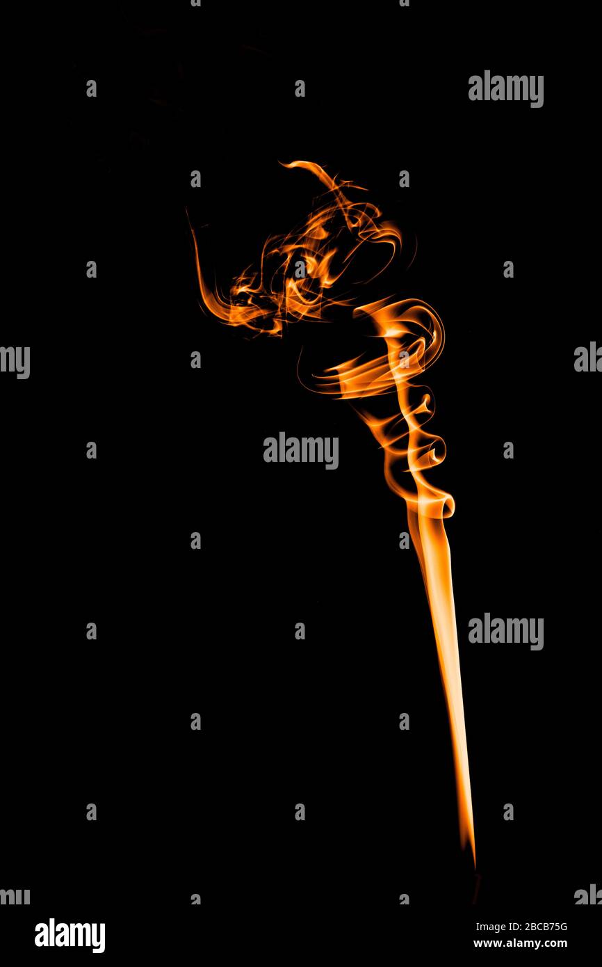 colored smoke shapes with black background Stock Photo