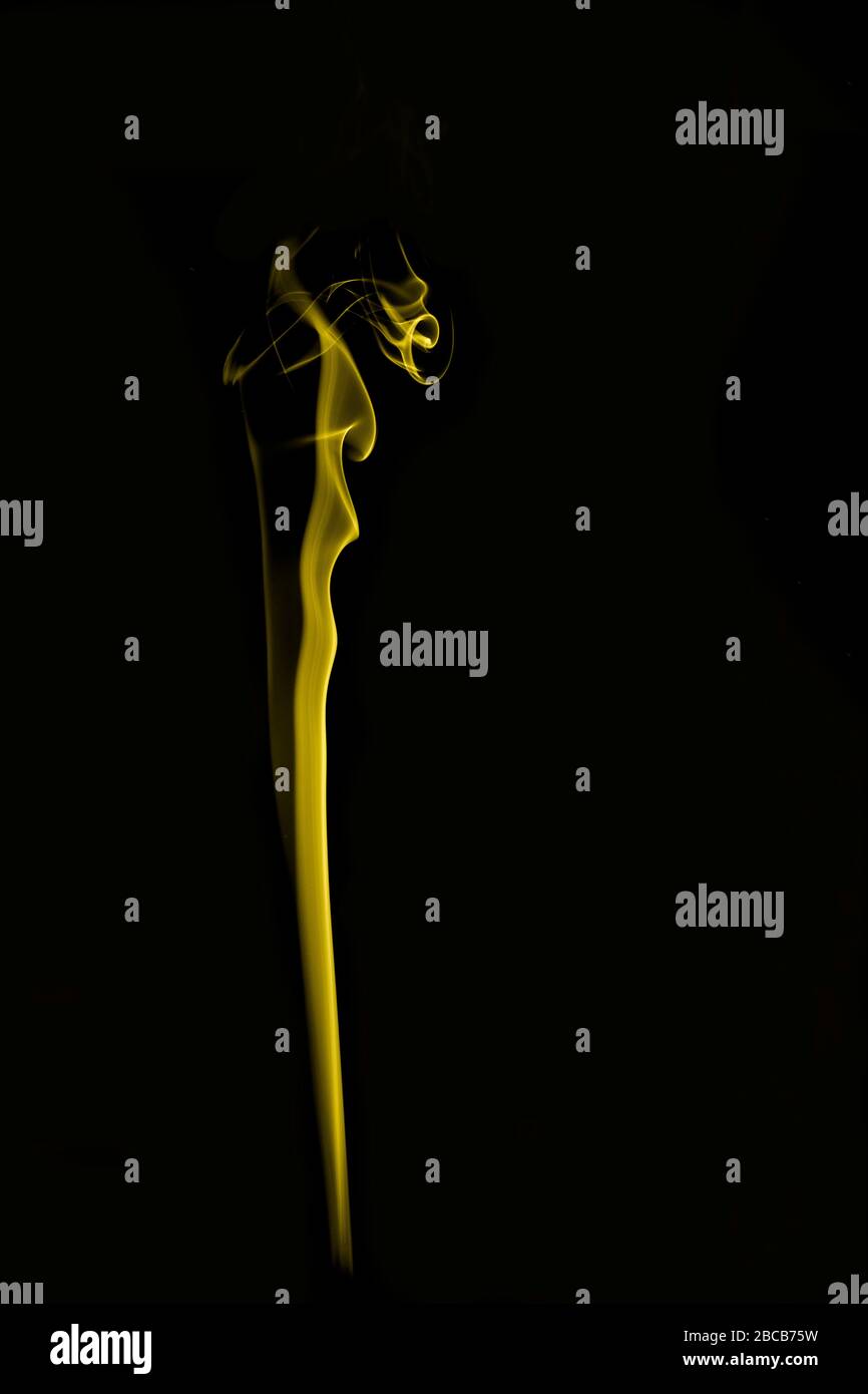 colored smoke shapes with black background Stock Photo