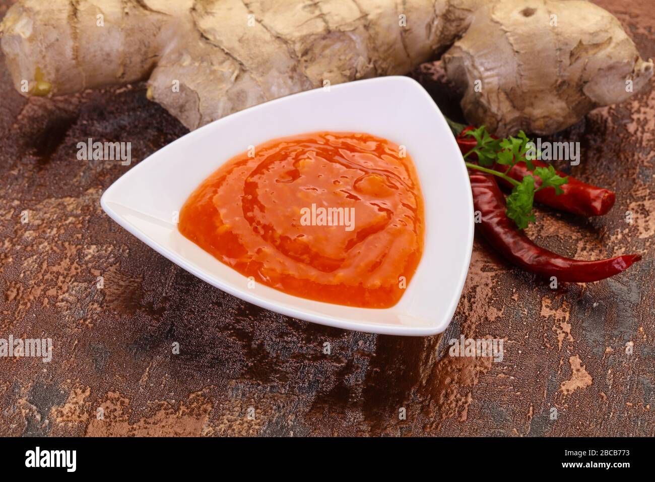 Ginger chili sauce with root and pepper Stock Photo - Alamy
