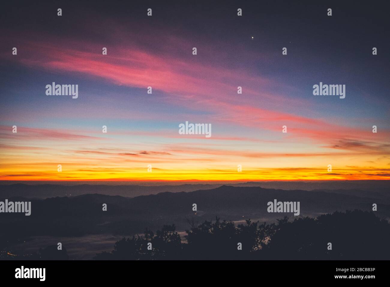 sky shading in the morning from orange to blue Stock Photo