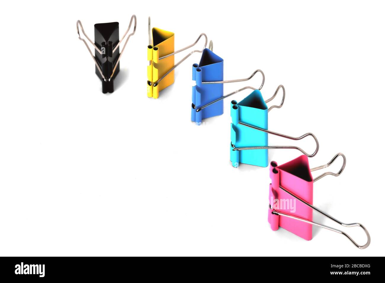 Clips for paper standing vertically on a white background Stock Photo